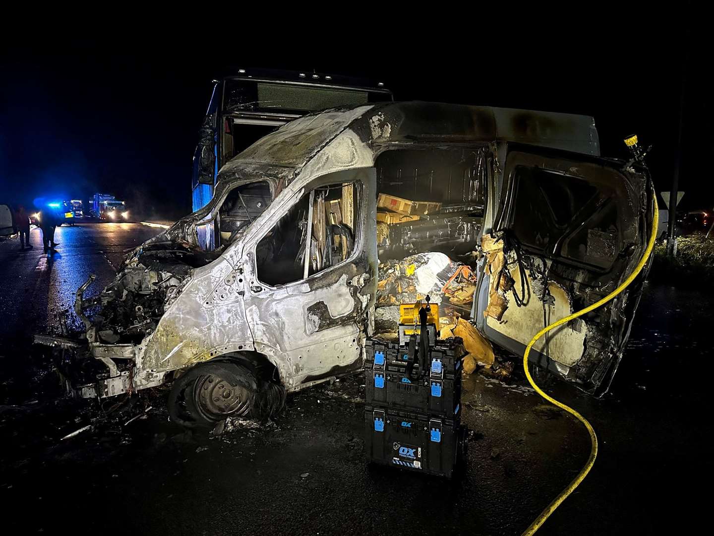 The charred remains of the delivery van