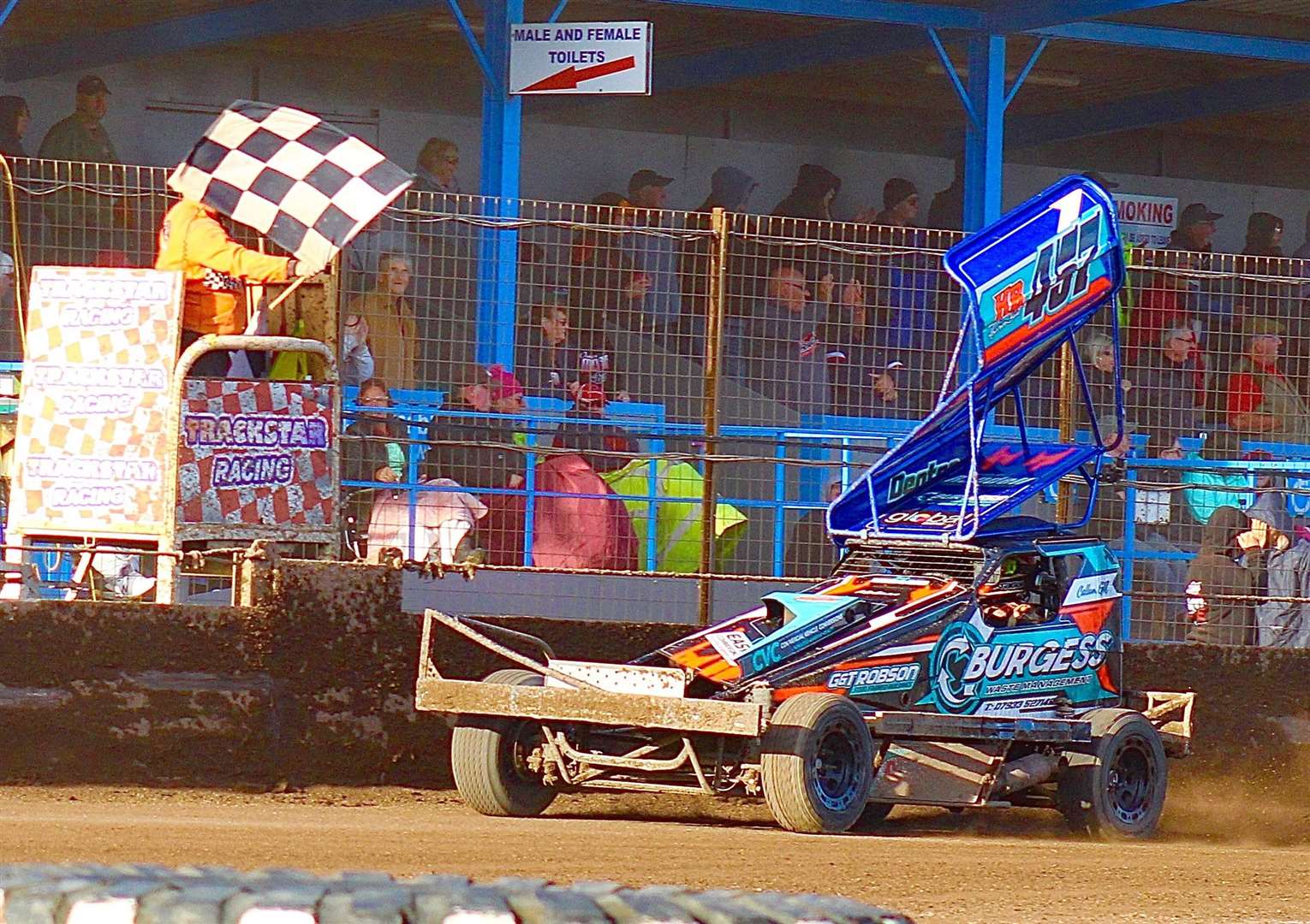 Callum Gill takes the chequered flag in the F1 stock cars on Saturday. Picture; Kieran Bonsall