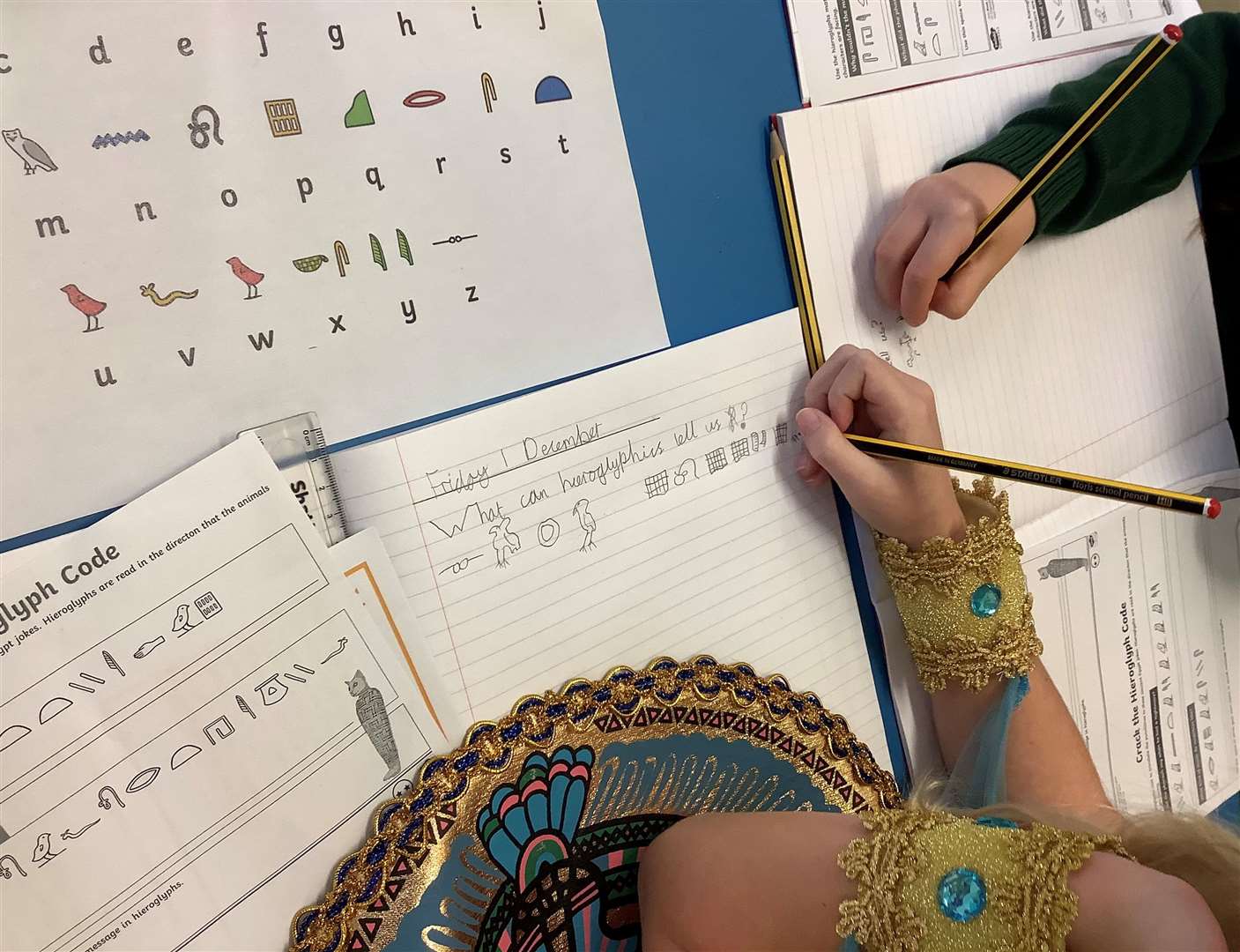 The children learned to write their names in hieroglyphs.