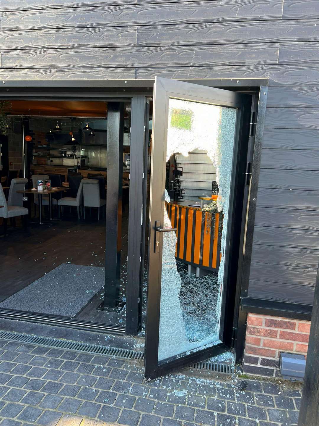 The damage caused to the Jolly Fryer’s door by the burglars