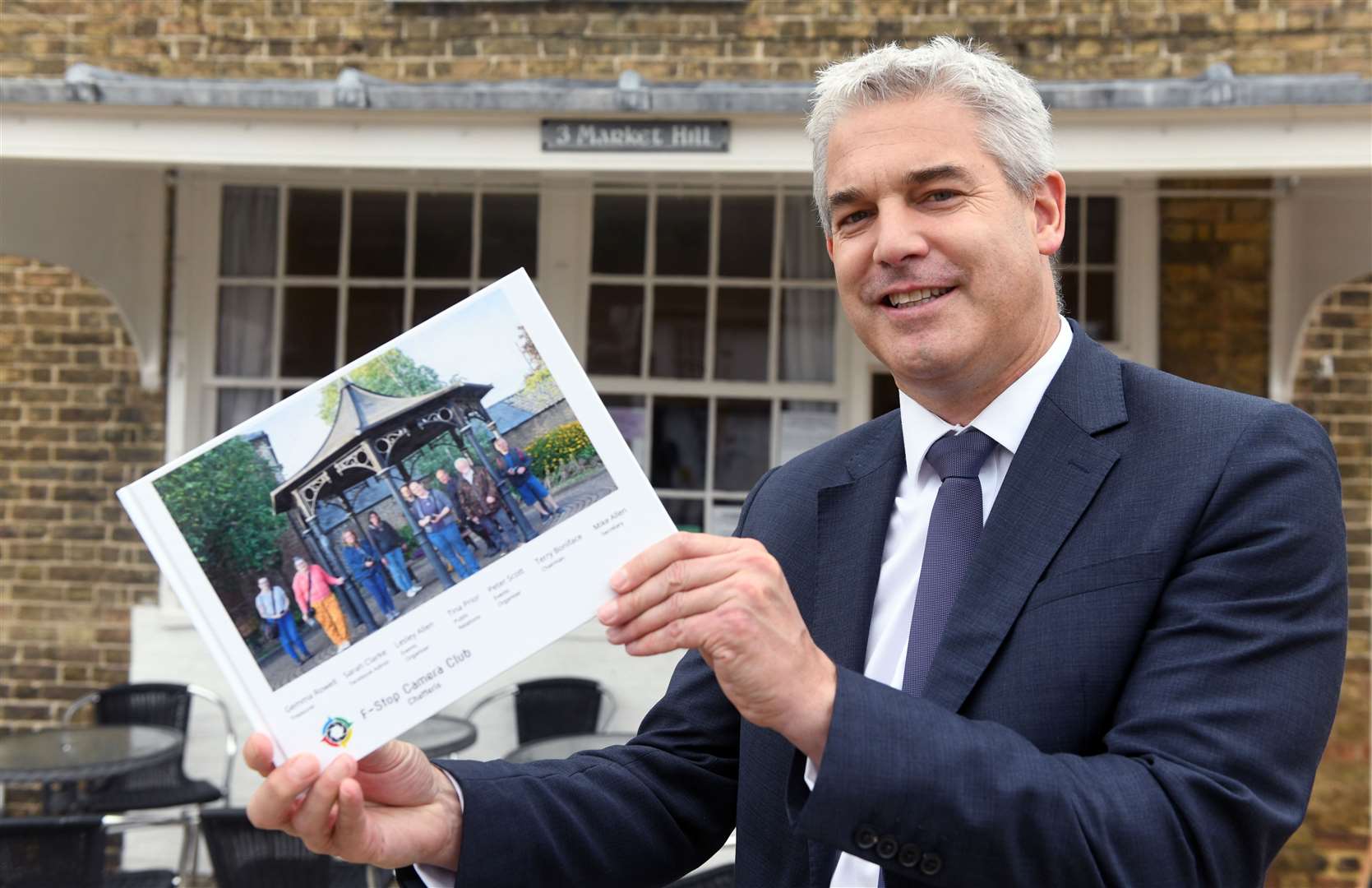 Steve Barclay, MP, with a copy of the book produced by the F-Stop Camera Club at Chatteris. (42542579)