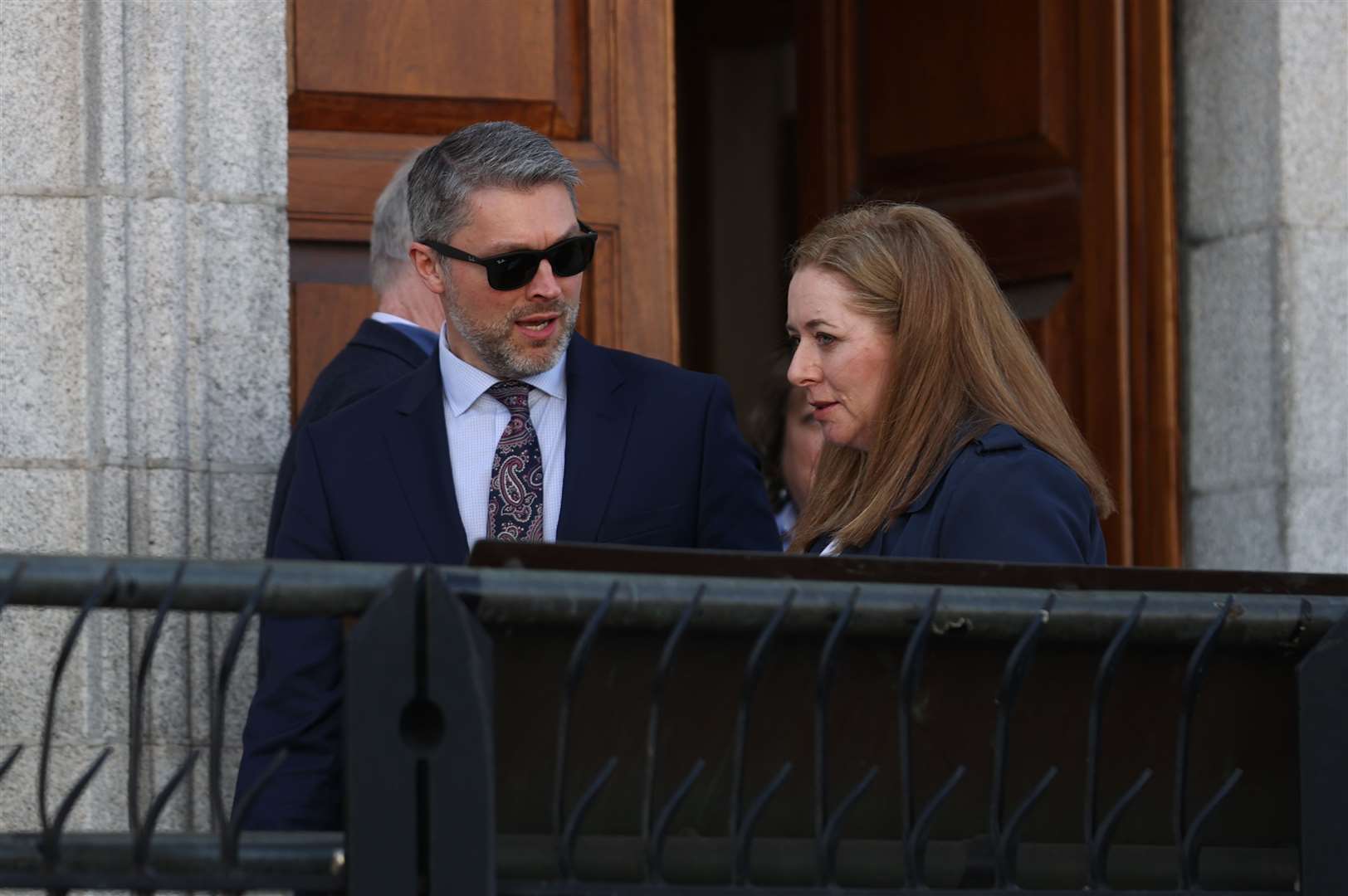 Adam Smyth, director for BBC Northern Ireland and reporter Jennifer O’Leary outside the High Court in Dublin (Liam McBurney/PA)