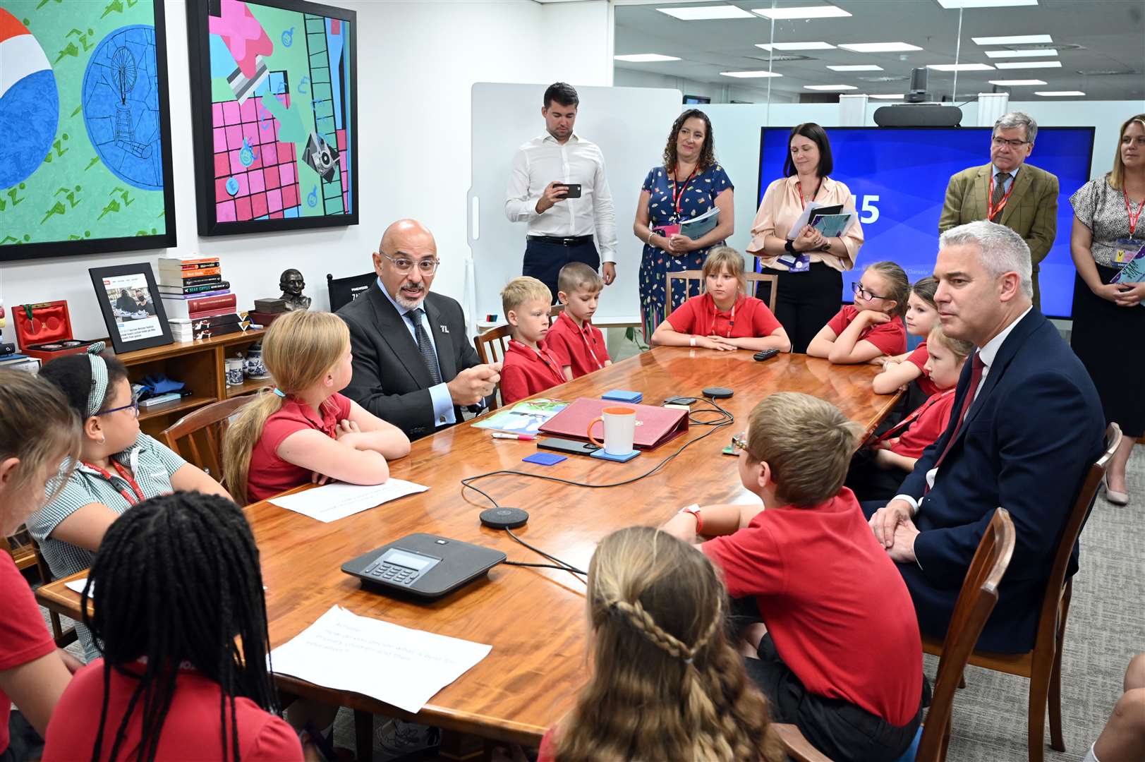 Orchards School visit to Department of Education to show the Secretary of State for Education Nadhim Zahawi a book that has been produced by the school. (57446755)