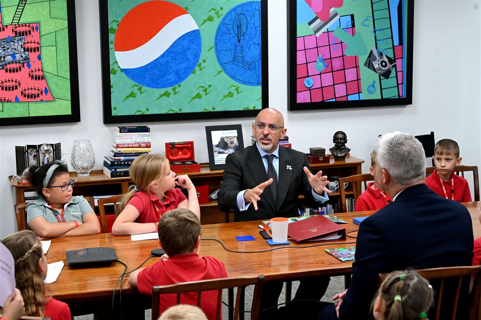 Orchards School visit to Department of Education to show the Secretary of State for Education Nadhim Zahawi a book that has been produced by the school. (57446951)