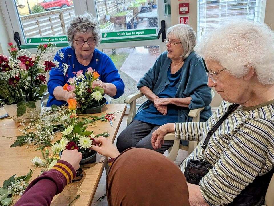 Residents enjoying international flower day on Friday