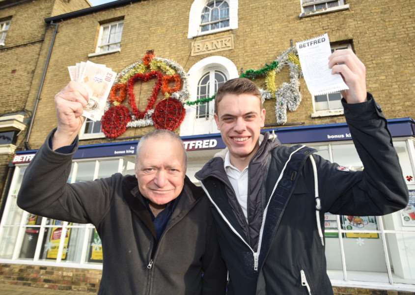John Dickerson with Lewis Sindle outside Betfred in Whittlesey