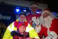 Town lights go on with record crowds to watch