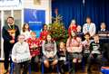 High school staff and students wear festive woollies for charity