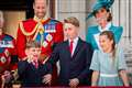 Royal decorum: George calms exuberant brother Louis during Trooping flypast