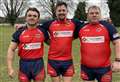 Men in Red top the table after another win
