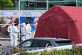 Man who died in supermarket shooting incident fired in the air as shoppers fled