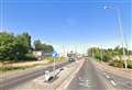 Part of busy main road closed following tractor fire