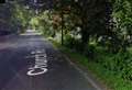 Fire in village woodland is thought to have been started deliberately