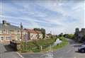 Police, fire and ambulance services called after van plunges into river