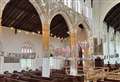 Easter festivities at village church with decorations and egg hunt