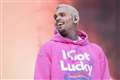 Chris Brown remanded after appearing in court charged over ‘bottle attack’