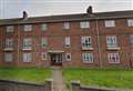 Man in his 60s dies following flat fire