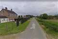 Fire crews battle village building blaze