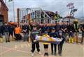 Young wannabe RNLI lifeboat man hands over charity cash