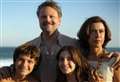 Masterful political drama shown through the perspective of an uninvolved family.