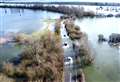 Drone photos reveal extent of water on village road as flood alert issued