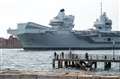 Royal Navy aircraft carrier returns to base after successful sea training