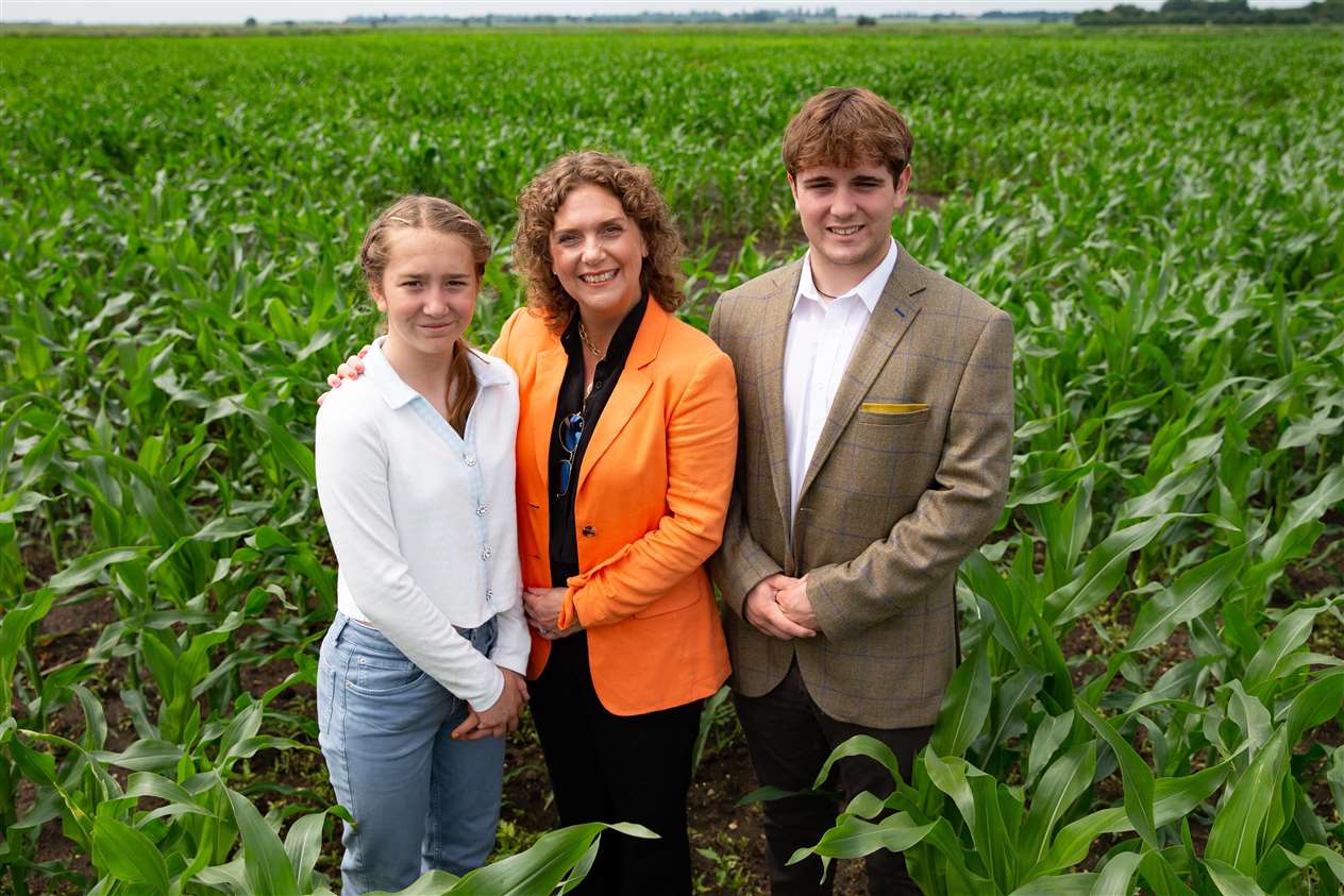 Hannah, Benji, Georgia Ingram-Moore visit the world's largest image of Captain Sir Tom Moore at Skylark Garden Centre. Photo: Terry Harris (49041277)