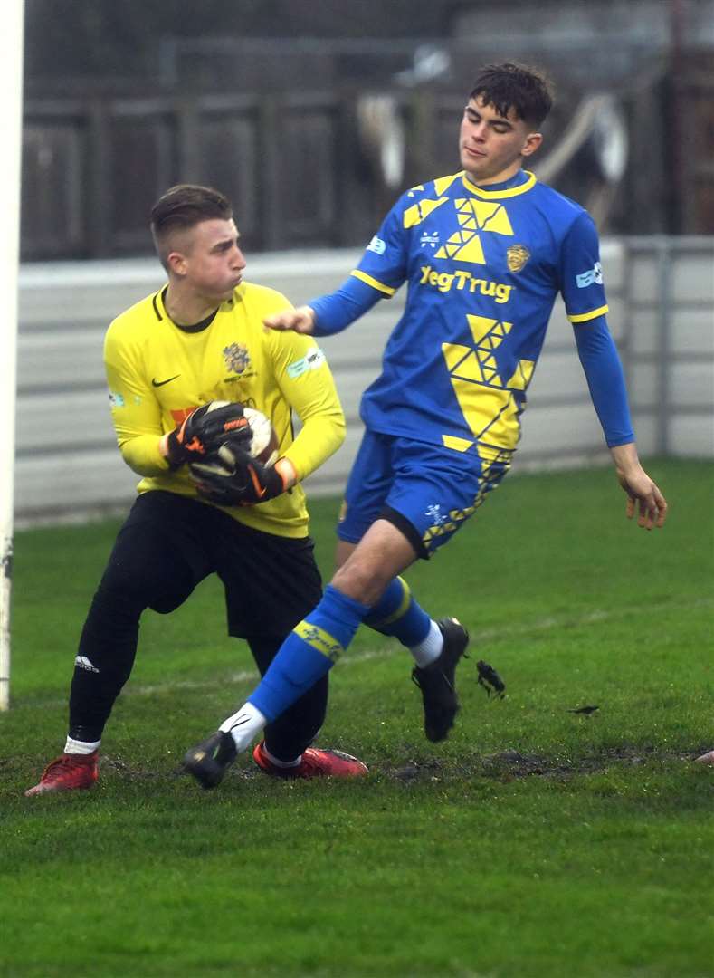 Wisbech keeper Sam Wilson in action.