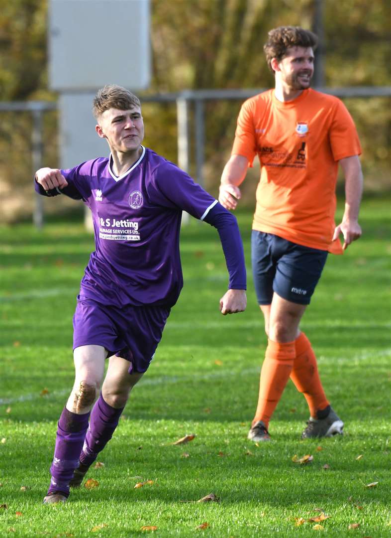 Harvey Neale celebrates his opening goal.