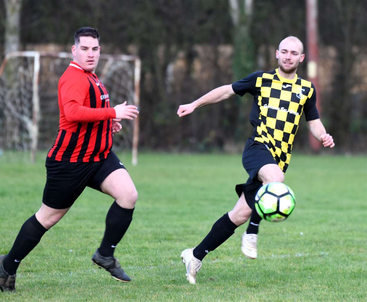 Guyhirn v Wimblington football action.
