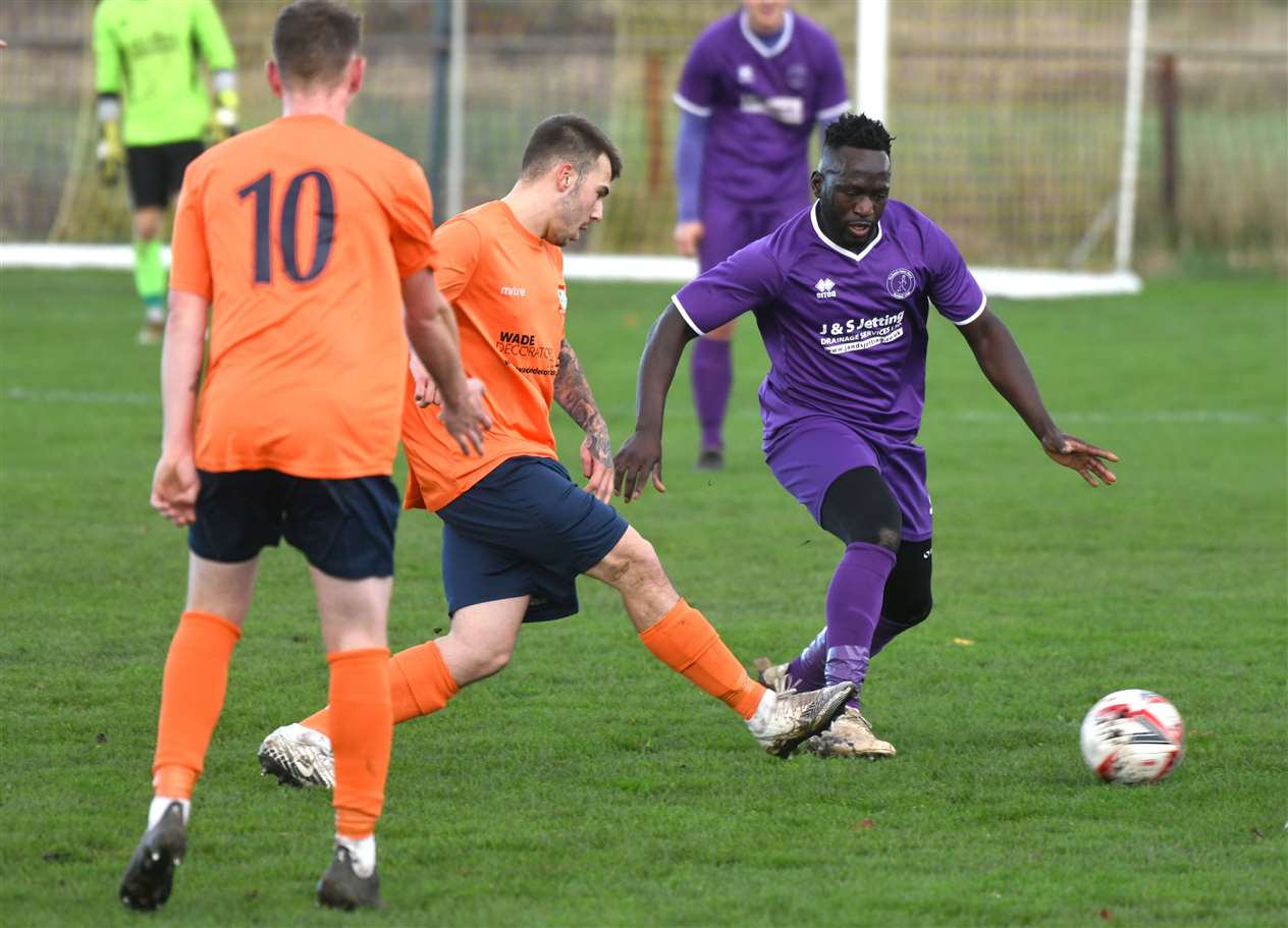 Fernand Bass in defensive action.