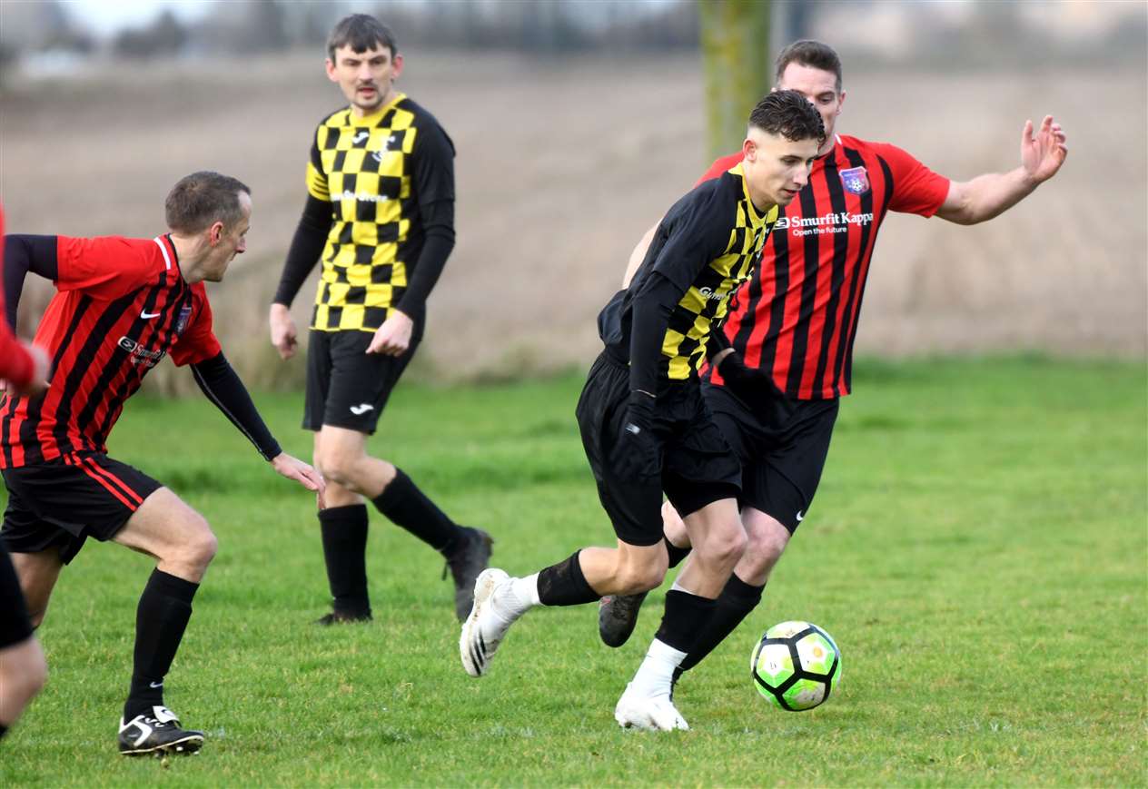 Guyhirn v Wimblington football action.