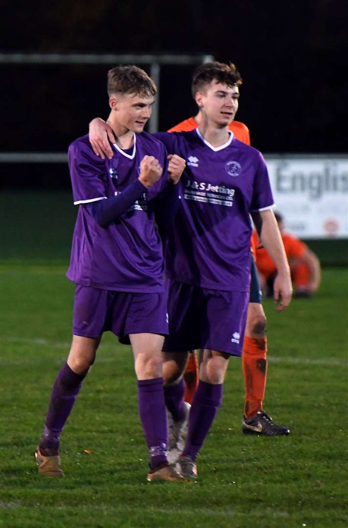 Harvey Neale and Luke Fox celebrate a memorable win.