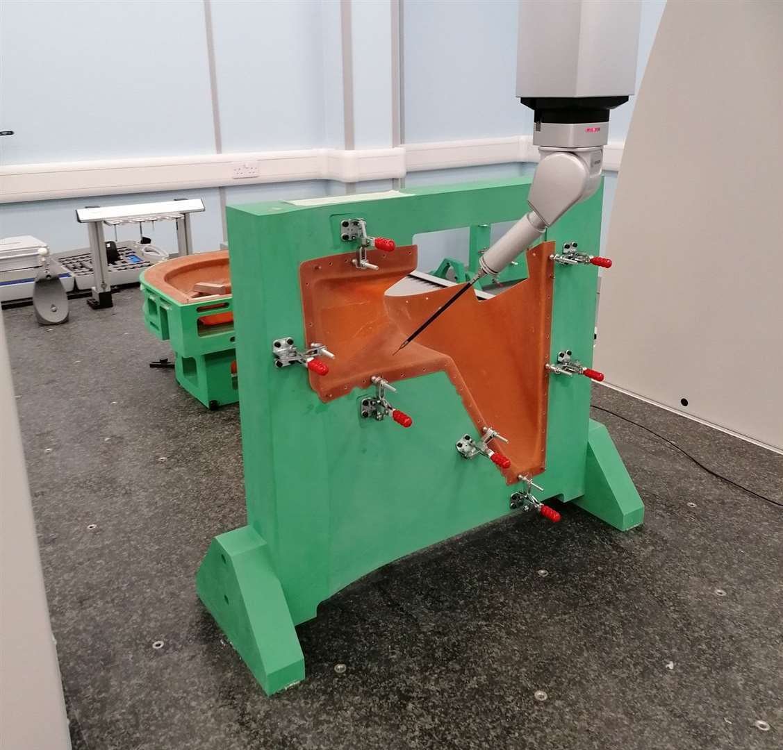 This machine robotically checks each component to within 2.5microns (a human hair measures 65 microns). (41922718)