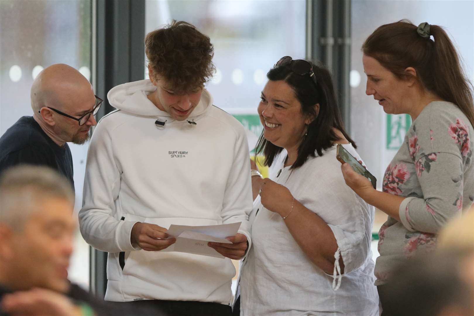 This GCSE student at Wisbech Grammar School shares his joy with others as he opens his results.