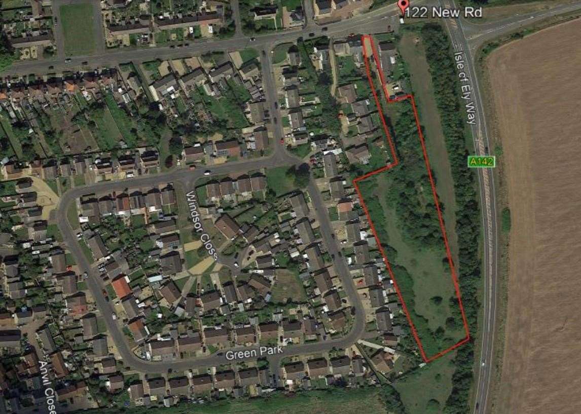 The proposed site is outlined in red. Image: Google Earth.