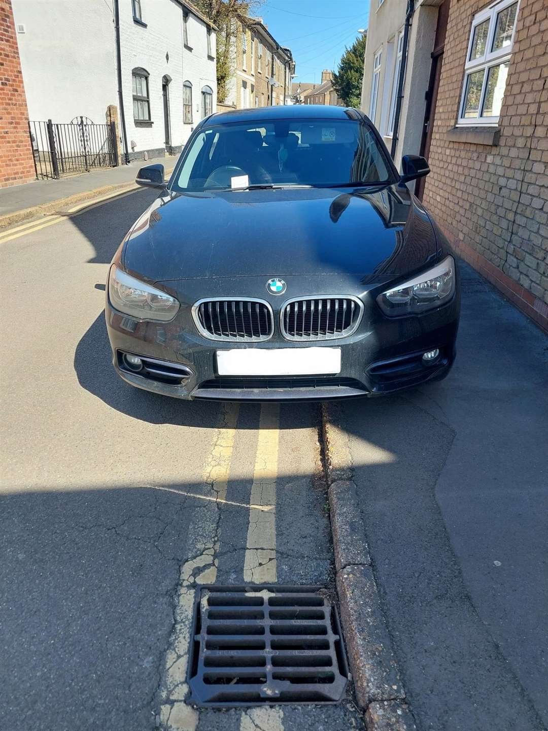 This BMW driver thought they could get away parking on a double yellow line