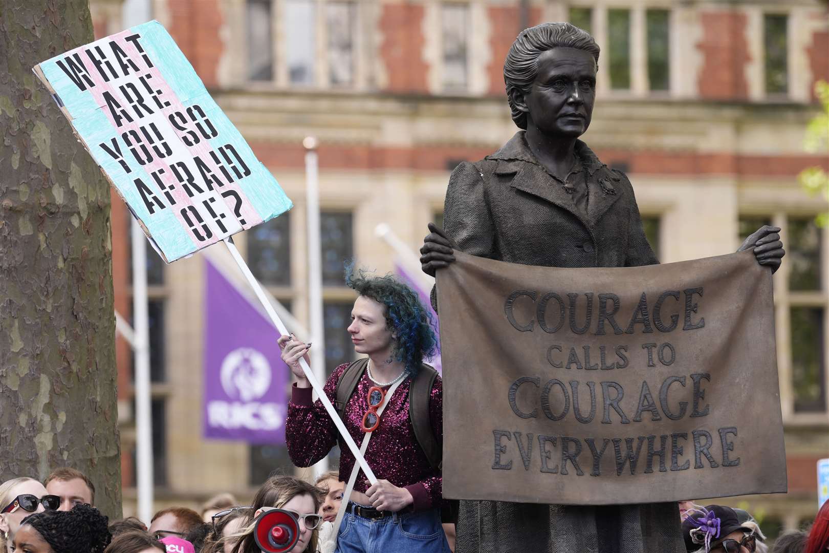 Campaigners during the rally in Parliament Square (Andrew Matthews/PA)