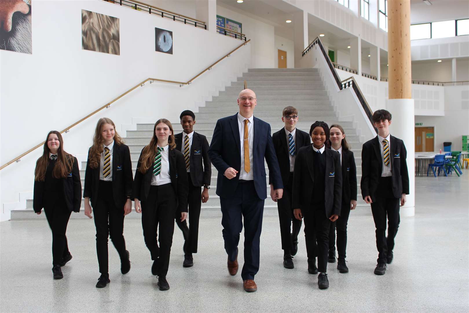 Thomas Clarkson principal Matthew Dobbing pictured with some of the school's students