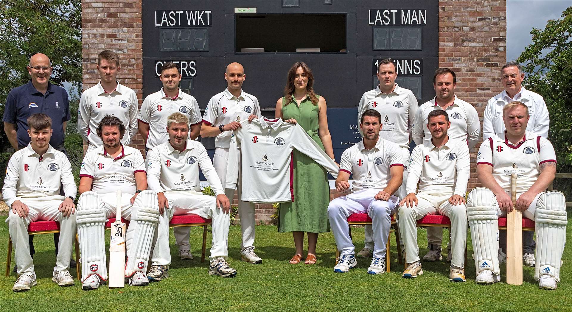 March Town Cricket Club's first XI face the camera, from left (back) chairman and scorer Ian Liversedge, Sam Clarke, Toby Nulty, captain Callum Young, Ashlie Barnard of main club sponsor Mayflower Financial Planning, Lewis Welcher, Ben Pyle and club secretary and umpire Les Mills, (front) Kai Pooley, Tommy Howgego, Brandon Phillips, Josh Fisher, Adam Conyard and James Hilliard.