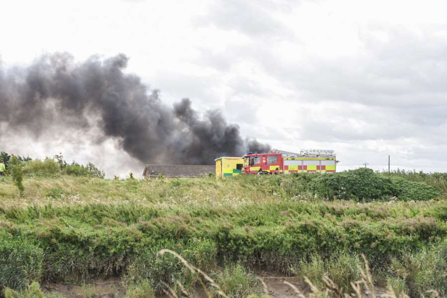 Fire crews tackle a farm fire off South Brink near Wisbech. It sending smoke billowing across the A47 causing problems for drivers.