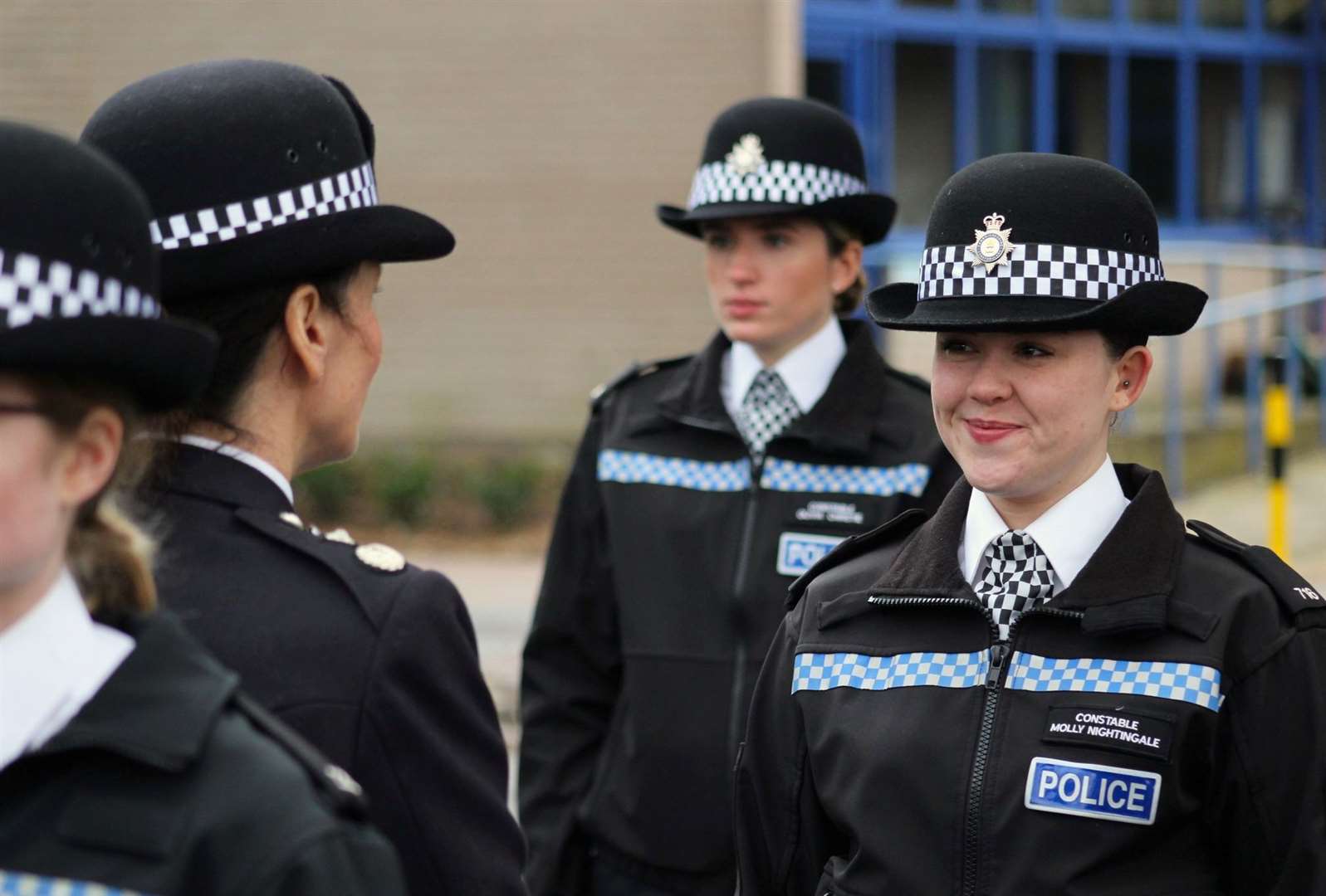 Fourteen new police officers celebrated the start of the new year today by passing out in front of family and friends.