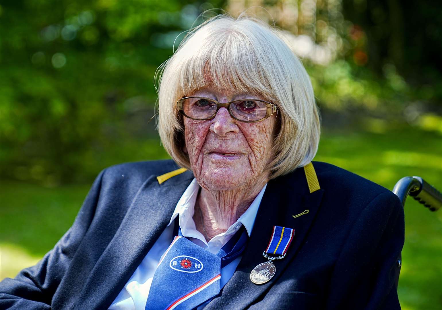 Veteran Jean Mack, 92, who went on to serve in the Royal Navy, remembers a piper playing in her street on VE Day (Peter Byrne/PA)