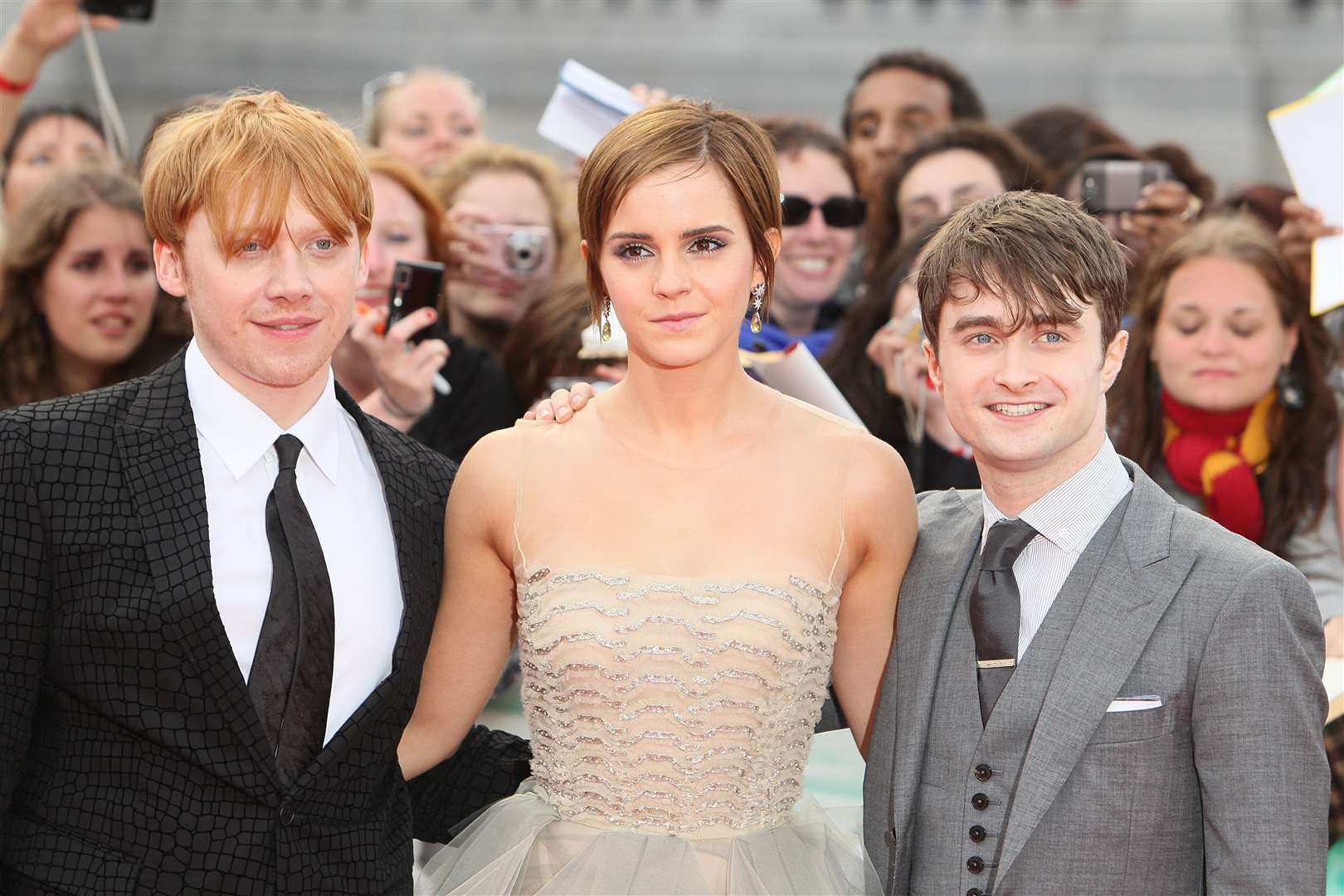 Rupert Grint, Emma Watson and Daniel Radcliffe, stars of the original movies (Dominic Lipinski/PA)
