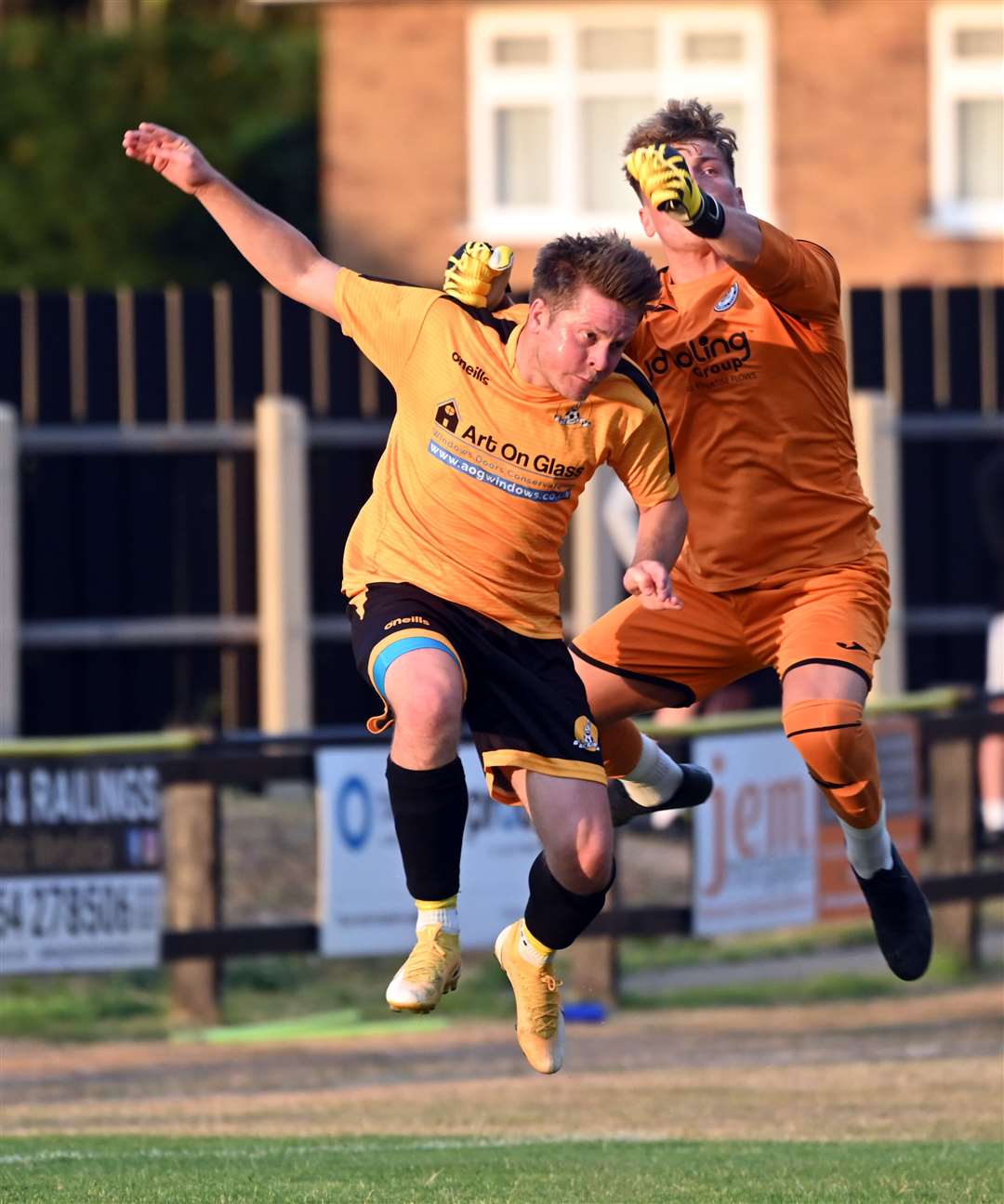 Jack Saunders challenges the Holbeach keeper