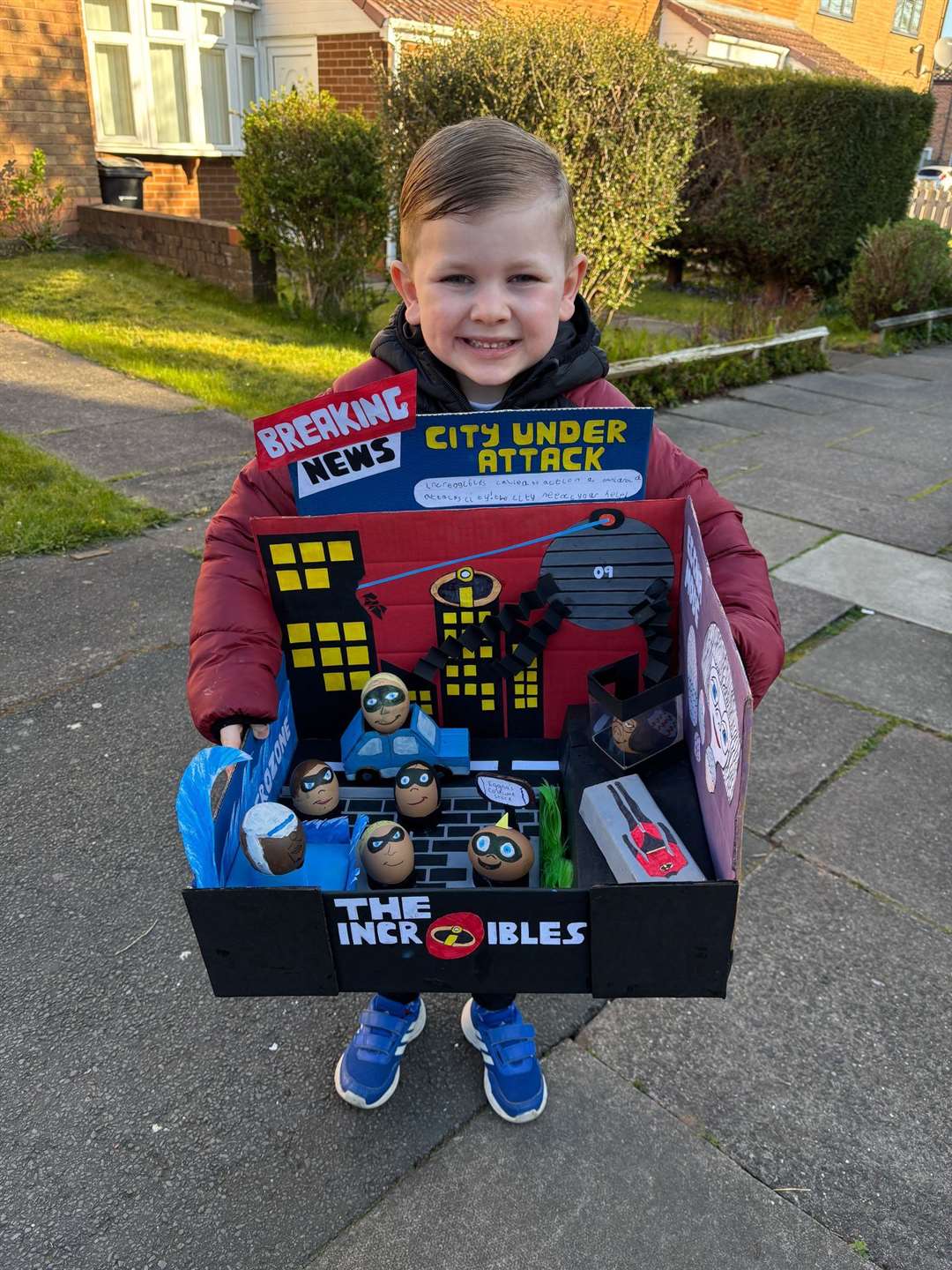 Caleb with his Incredibles inspired egg project (Megan Ensor/PA)