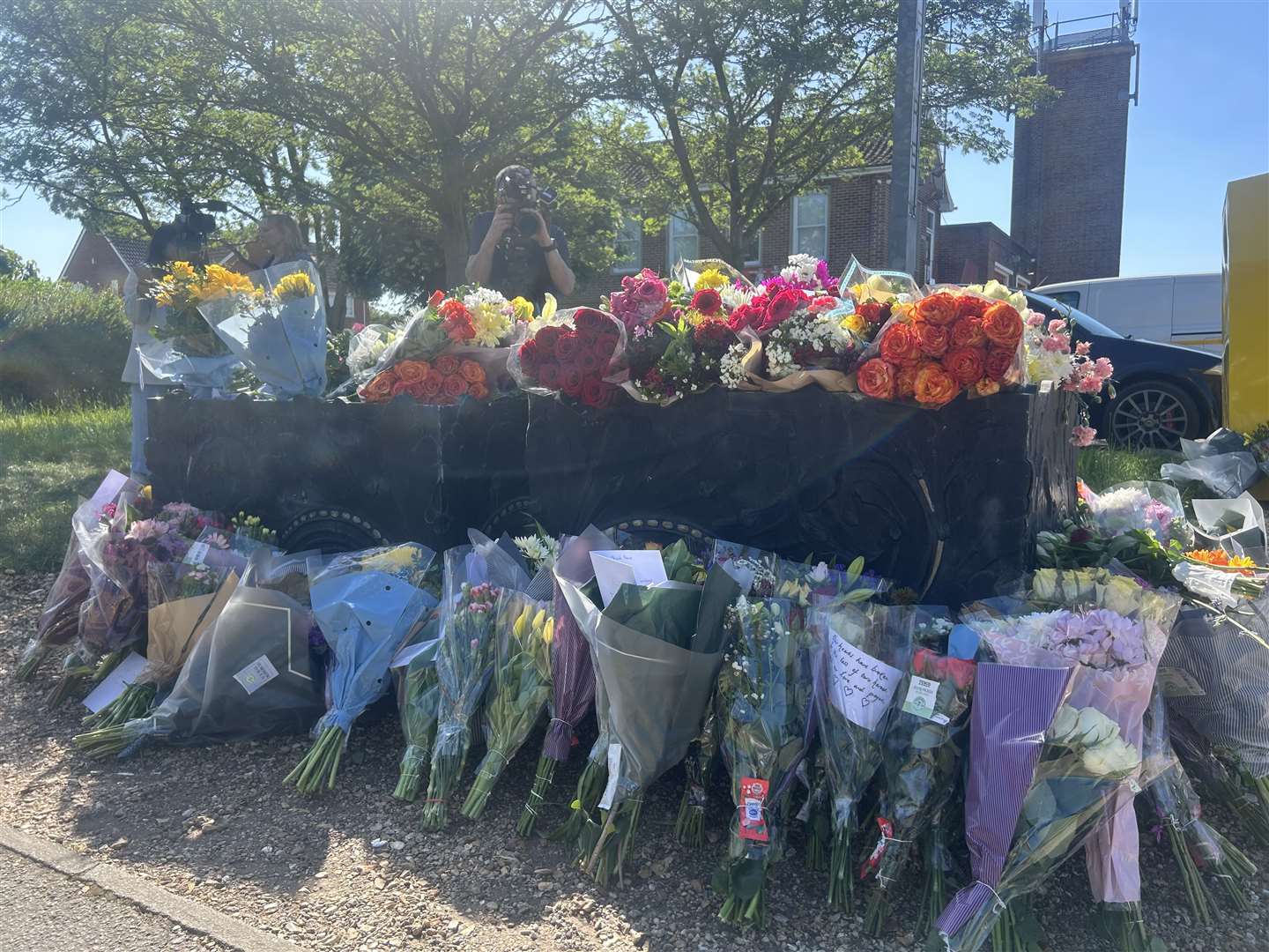 Floral tributes are seen outside Bicester Fire Station (Emily Smith/PA)