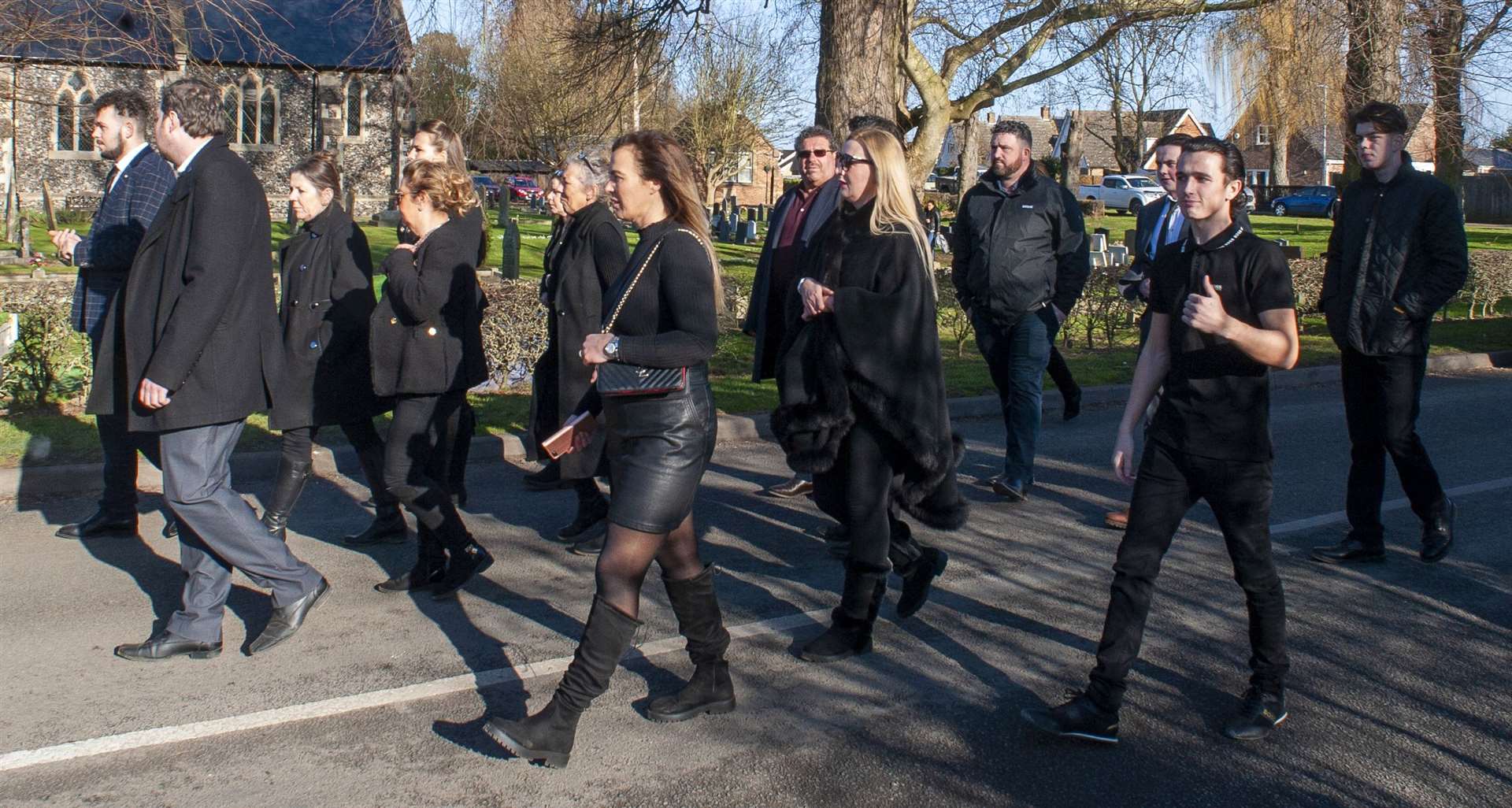Walking behind the coffin