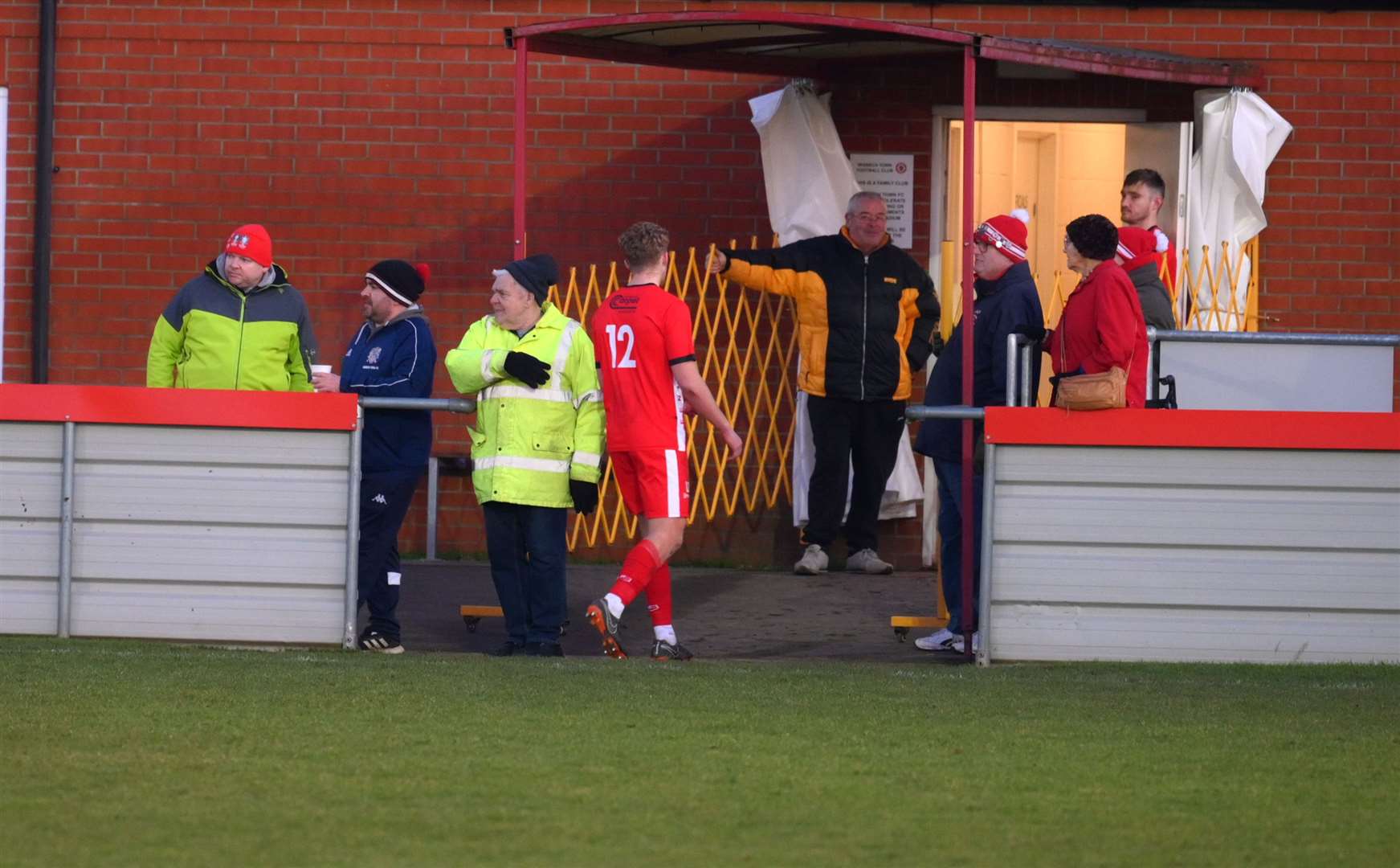 Max Mattless looks on as Archie Wallace joins him on a red card