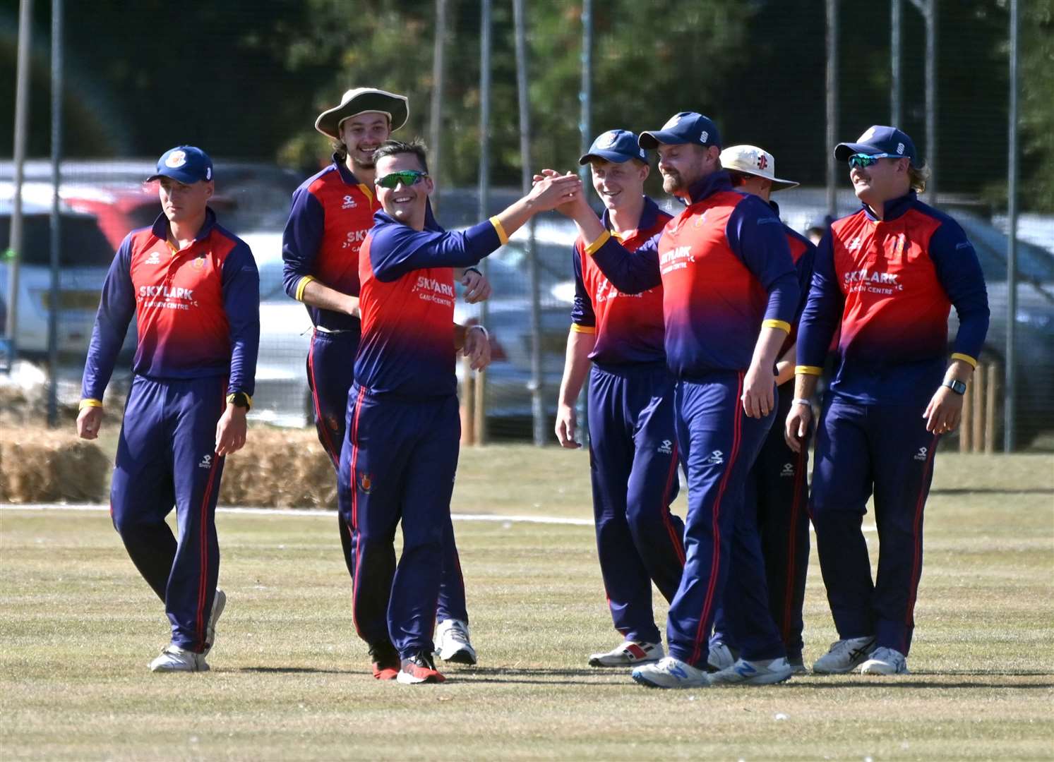 Wisbech cricket club hosting the Lashings cricket club..Wisbech celebrating the wicket of Kirk Edwards. (58619574)